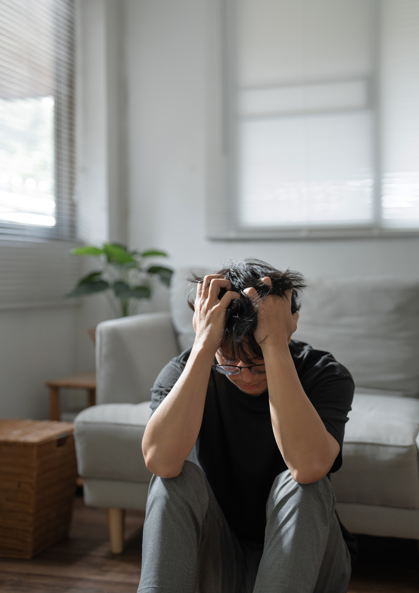 Anxiety Counselling woman sitting on bed recovering from trauma
